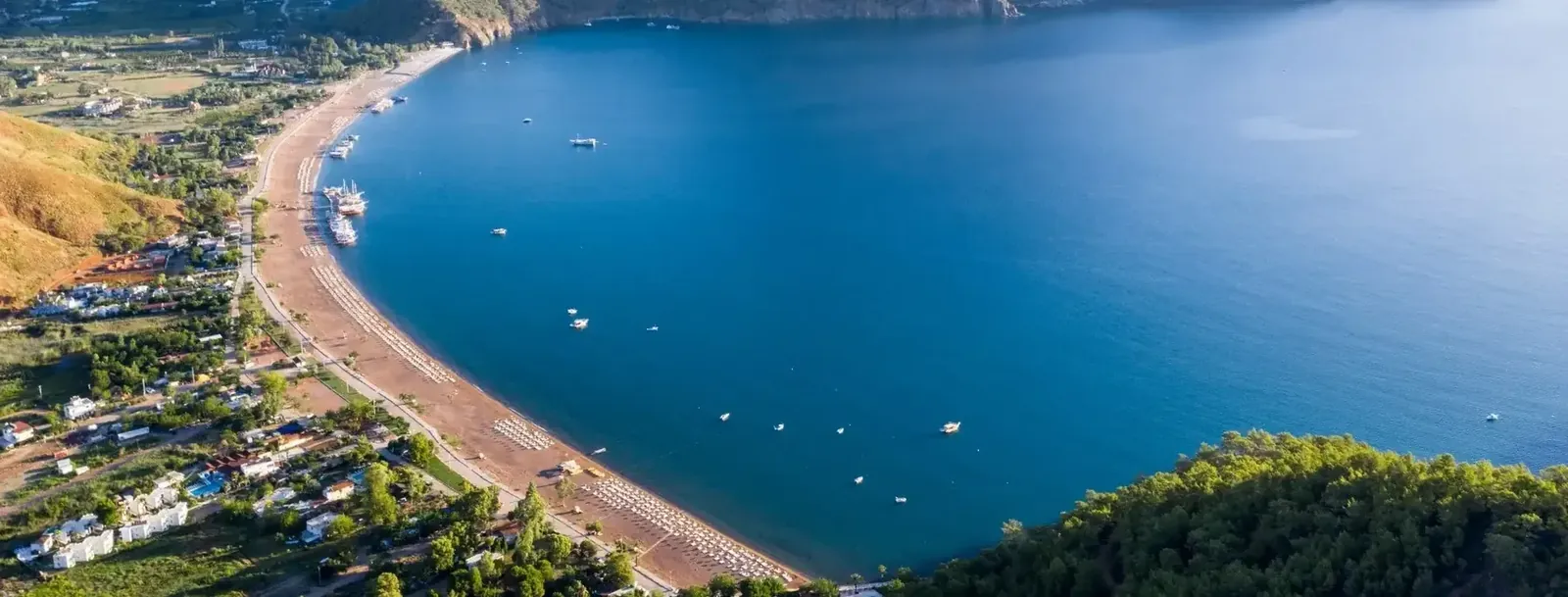 Adrasan Bay with its two-kilometre beach and pine forest, aerial view